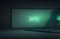 A dark developer workstation scene with neon green accents highlighting a terminal displaying Go code, illustrating goroutine leaks in Go.