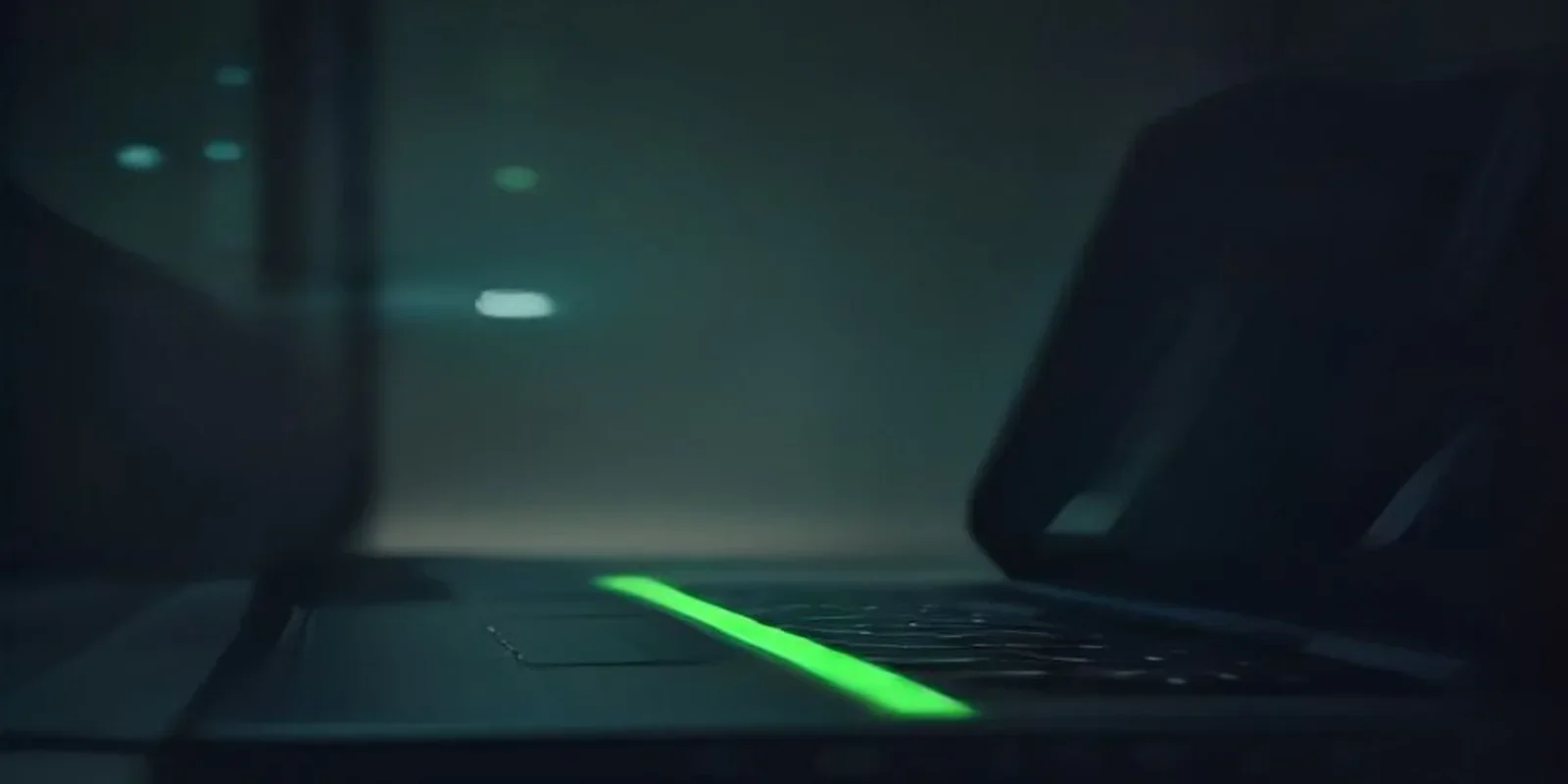 A futuristic dark-mode blog cover featuring glowing green neon accents and the text "AI AGENT MONOREPO" centered over a sleek laptop keyboard.