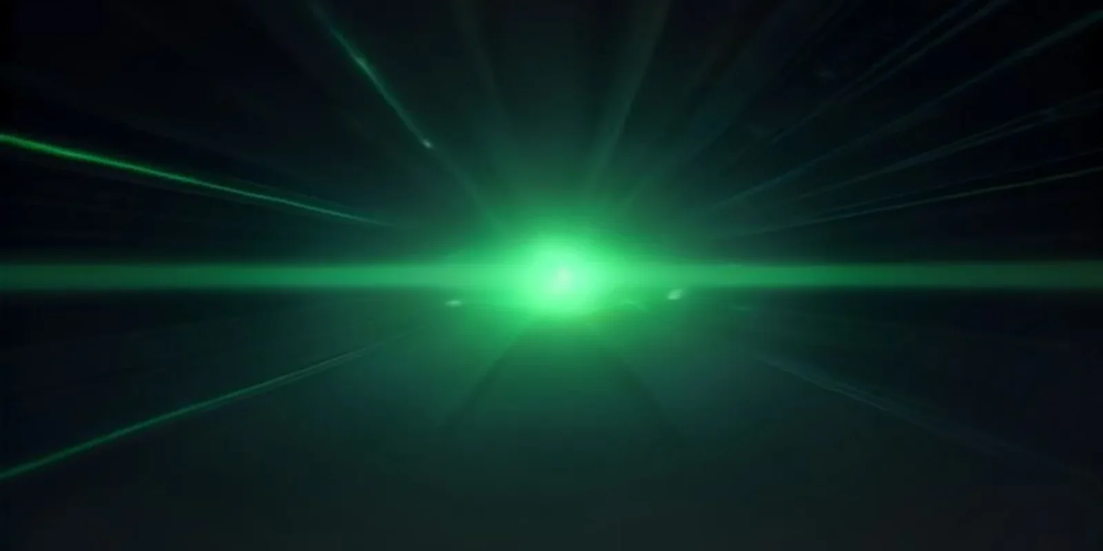 Dark developer setup with glowing green terminal code reading "OPEN VOICE AI" and neon pipeline graphic.